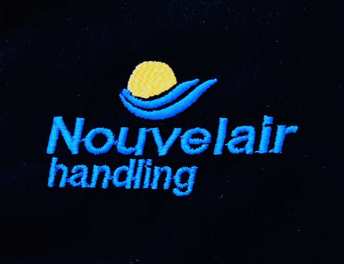 Nouvelair Handling logo embroidered on a corporate polo, by Alias Broderie